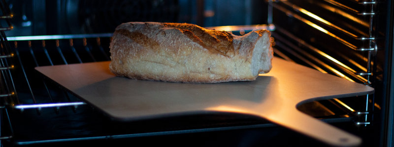 Flammkuchenschieber aus HPL Platte gefräst Flammkuchenschieber aus HPL Platte gefräst